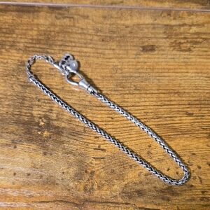 Silver chain bracelet with charms